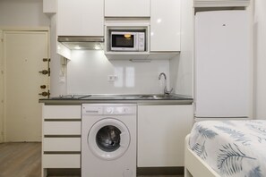 Fridge, microwave, toaster, cookware/dishes/utensils