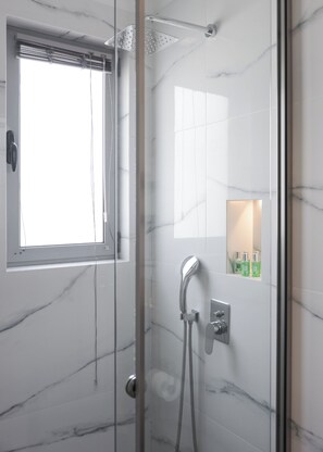 Shower, hair dryer, towels, soap