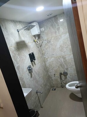 Deluxe Double Room, City View | Bathroom | Free toiletries, slippers, towels, soap - HOTEL RJ RESIDENCY C.G.ROAD (Ahmedabad)