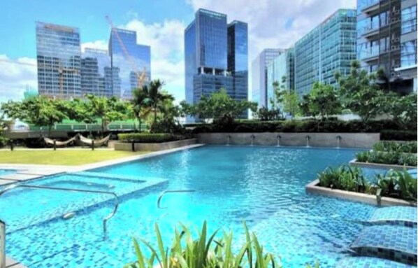 Apartment, 4 Bedrooms, Accessible, City View | Pool | Outdoor pool