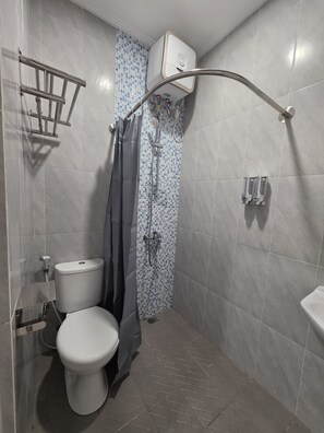 Shower, towels, soap, shampoo