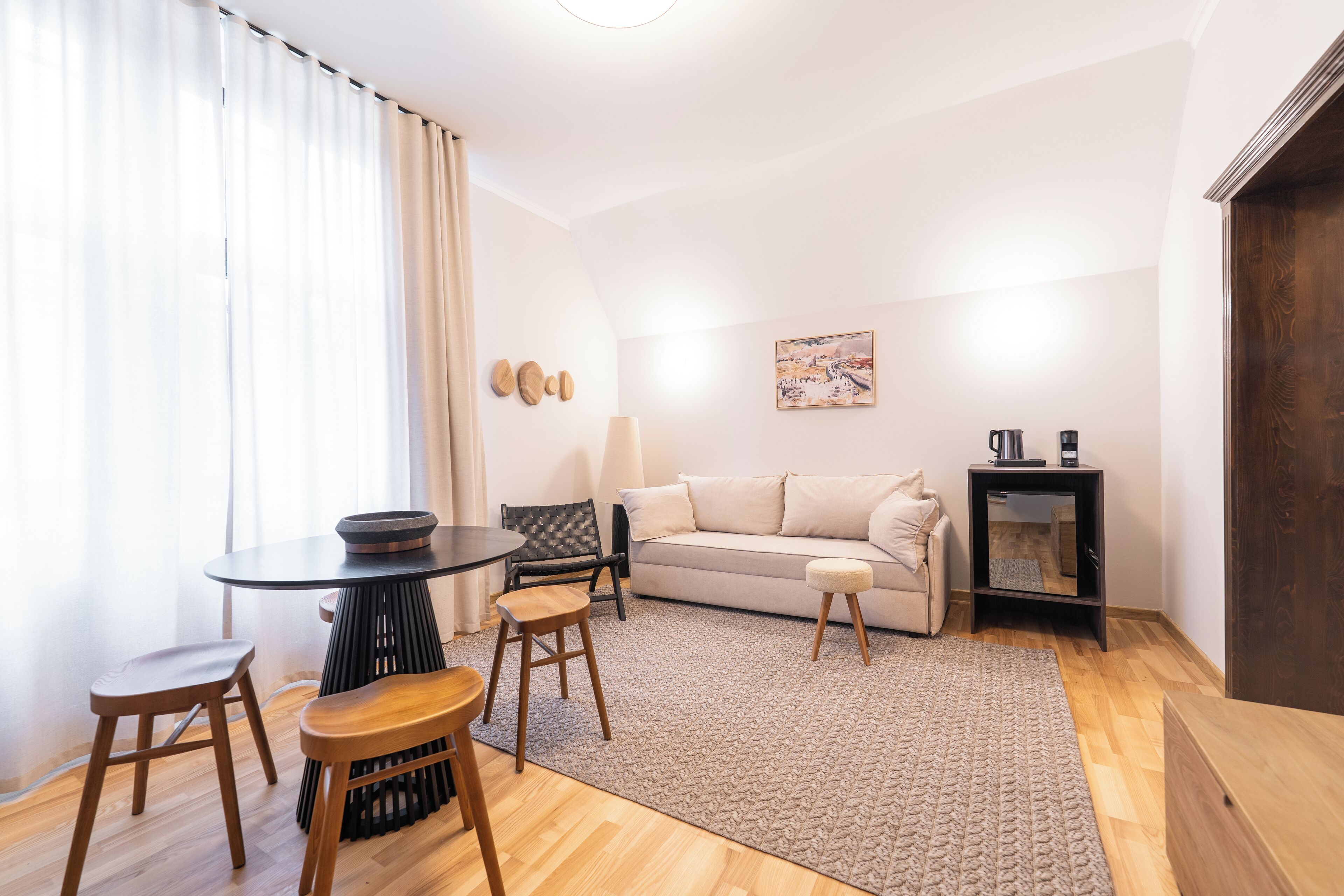 Family Suite | Living area | 50-cm Smart TV with cable channels