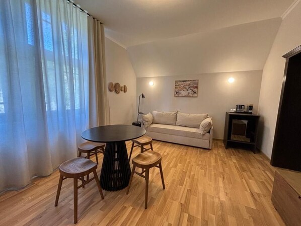 Family Suite | Living area | 50-cm Smart TV with cable channels