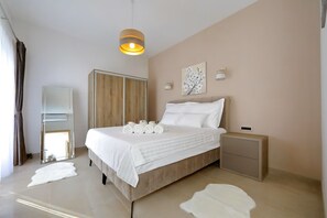 4 habitaciones, tabla de planchar con plancha y acceso a internet