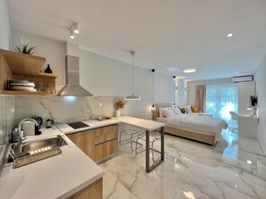 Deluxe Suite, Balcony | Private kitchenette | Espresso maker