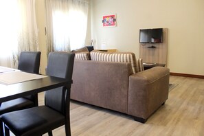 Deluxe Apartment | Living area