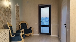 Deluxe Double Room, Balcony, City View | Iron/ironing board, free WiFi
