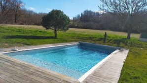 A rectangular swimming pool with a wooden deck surrounding it. - . Special PMR. Near one of France's most beautiful villages. Views (Brousse)