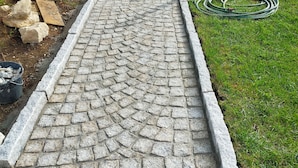 A paved pathway leading to a wooden deck with potted plants and a hose. - . Special PMR. Near one of France's most beautiful villages. Views (Brousse)