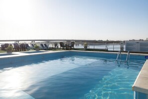 Outdoor pool, pool umbrellas, pool loungers