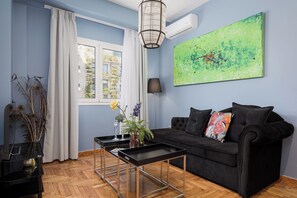 Apollon Apartment | Living room | 50-inch Smart TV with satellite channels, Netflix, streaming services