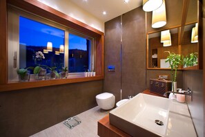 Shower, jetted tub, hair dryer, bidet