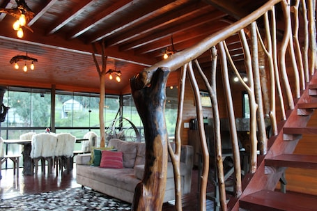 Deluxe Chalet, Patio, Lake View | Living area | TV