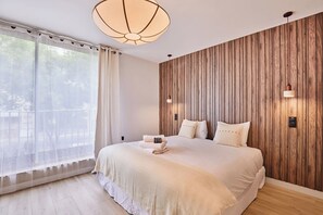 1 chambre, fer et planche à repasser, draps fournis