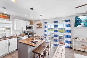 Fridge, microwave, dishwasher, coffee/tea maker