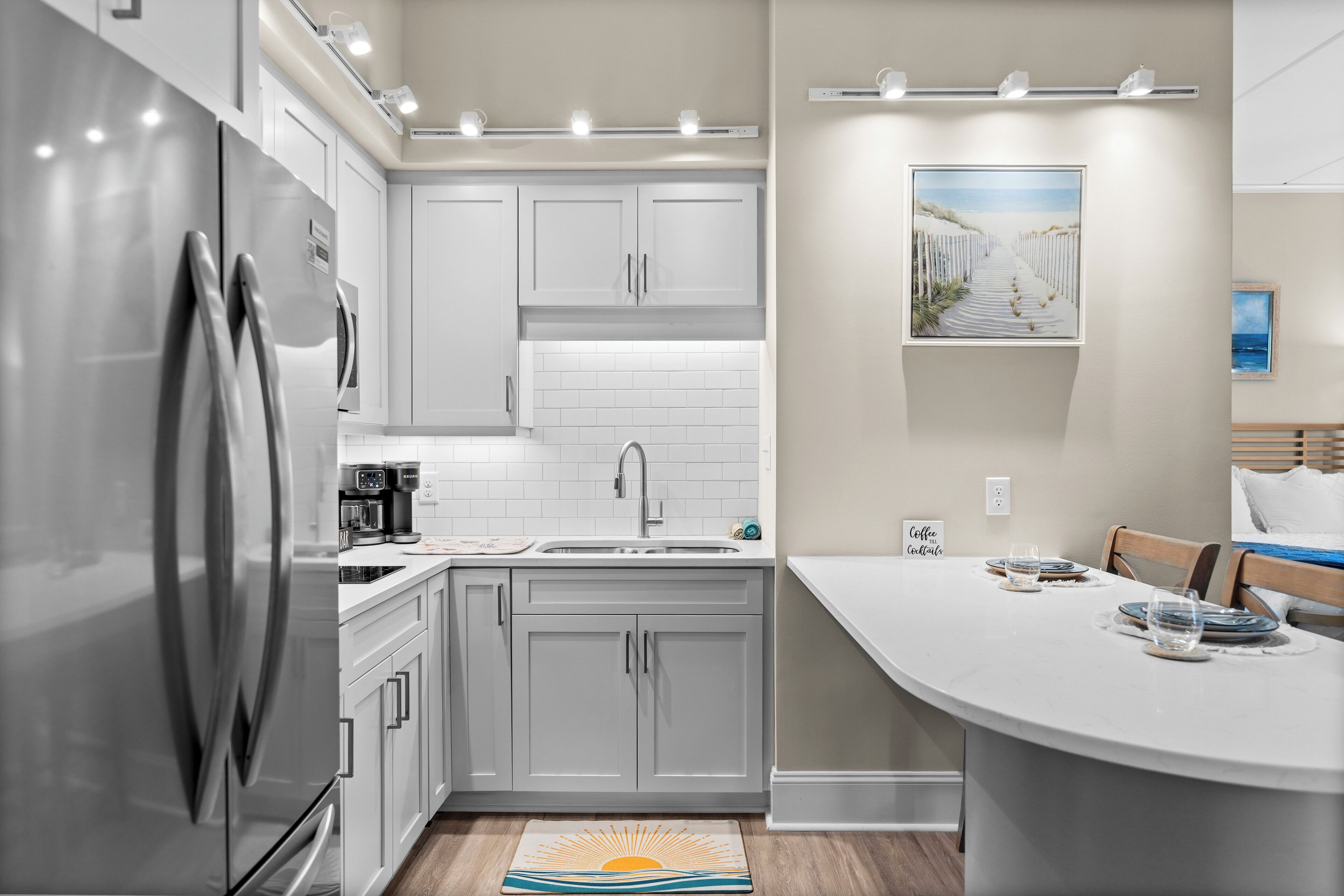Fridge, microwave, stovetop, coffee/tea maker