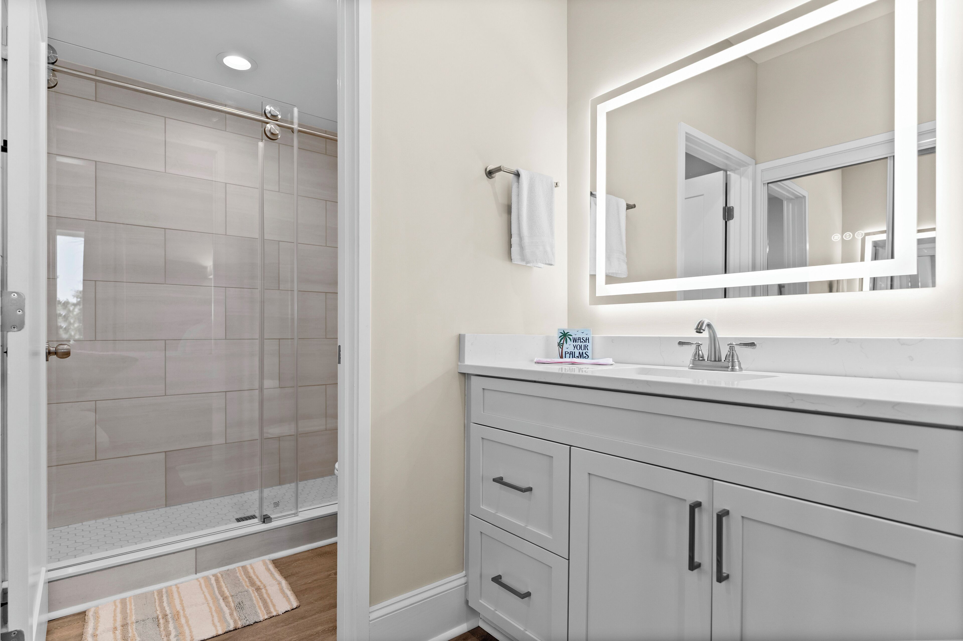 Shower, hair dryer, towels