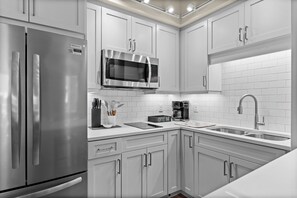 Fridge, microwave, stovetop, coffee/tea maker