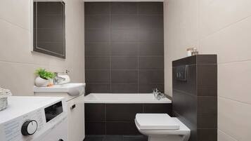 Shower, hair dryer, towels