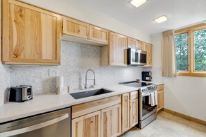 Microwave, stovetop, dishwasher, coffee/tea maker