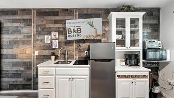 Fridge, microwave, cookware/dishes/utensils