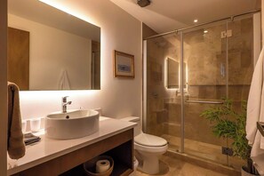 Shower, hair dryer, towels, shampoo