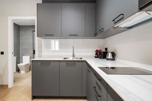 Apartment, Ground Floor | Private kitchen | Fridge, microwave, stovetop, dishwasher