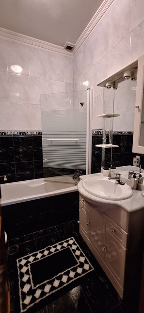 Hair dryer, bidet, towels, soap