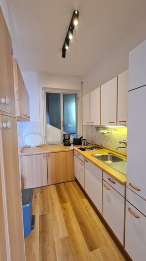 Fridge, microwave, coffee/tea maker, electric kettle