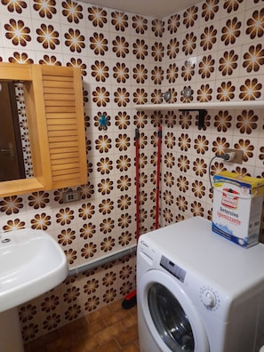 Shower, towels, soap, toilet paper
