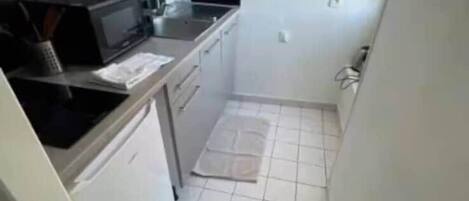 Fridge, microwave, high chair, cookware/dishes/utensils