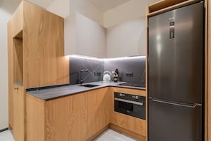 Apartment, 2 Bedrooms | Private kitchen | Microwave, stovetop, cookware/dishes/utensils