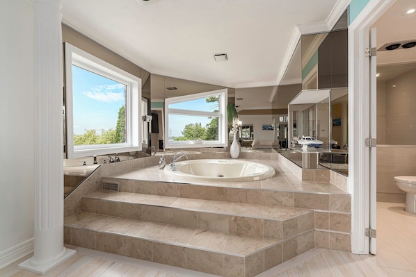 Shower, jetted tub, hair dryer, bidet