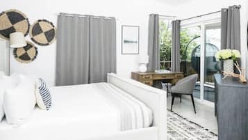 Desk, laptop workspace, blackout drapes, iron/ironing board