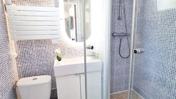 Hair dryer, towels, soap, shampoo