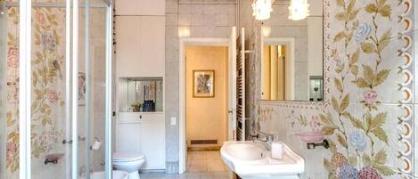 Hair dryer, bidet, towels, soap