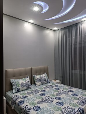 2 habitaciones, tabla de planchar con plancha, wifi y ropa de cama