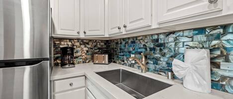 Fridge, stovetop, cookware/dishes/utensils