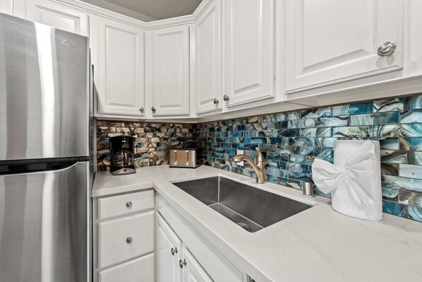 Fridge, stovetop, cookware/dishes/utensils