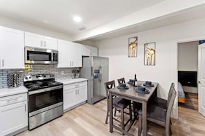 Fridge, microwave, oven, stovetop - Relax in Modern 2BR Retreat | Rooftop Deck + Views (San Diego)