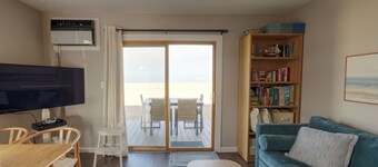 Waterfront Fort Pond Bay Co-op with Spectacular Sunset Views