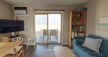 Waterfront Fort Pond Bay Co-op with Spectacular Sunset Views