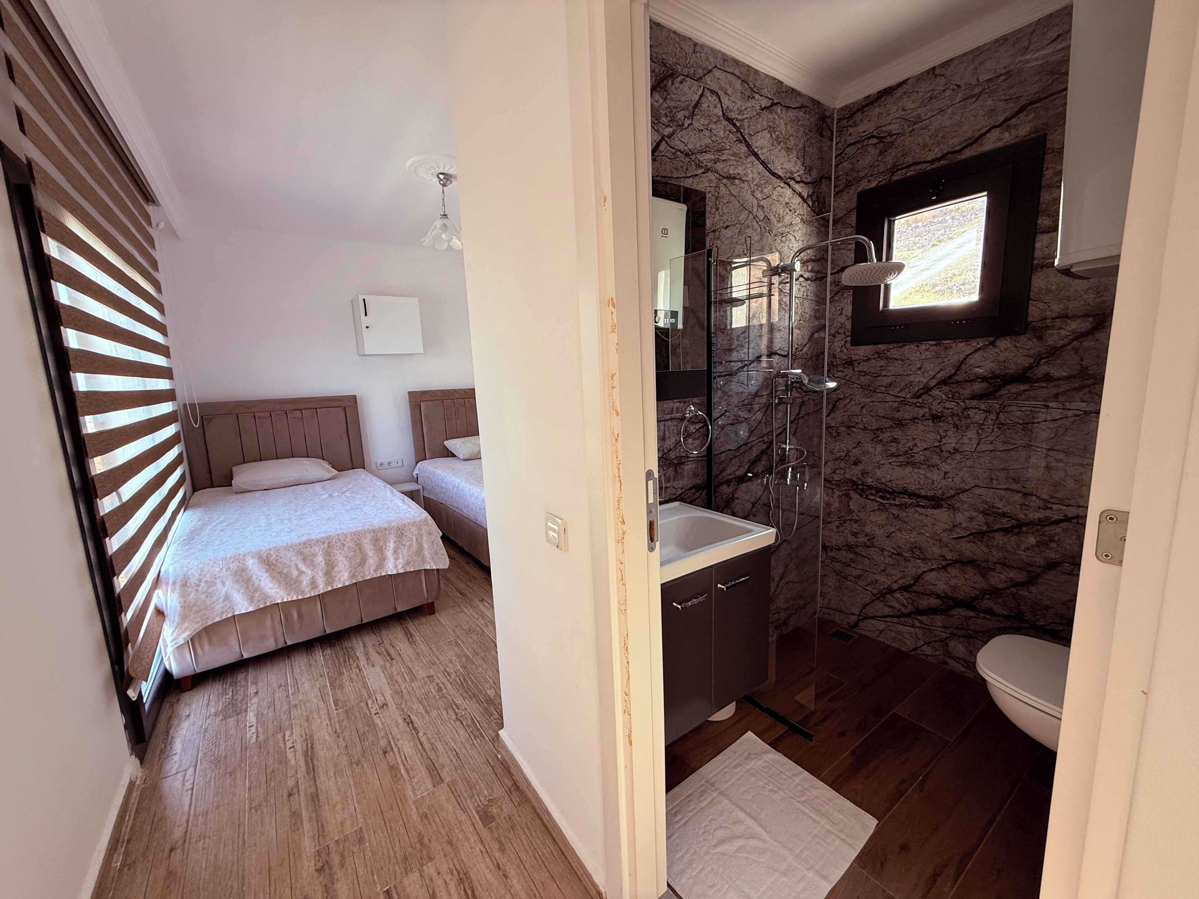 Shower, hair dryer, bidet, towels