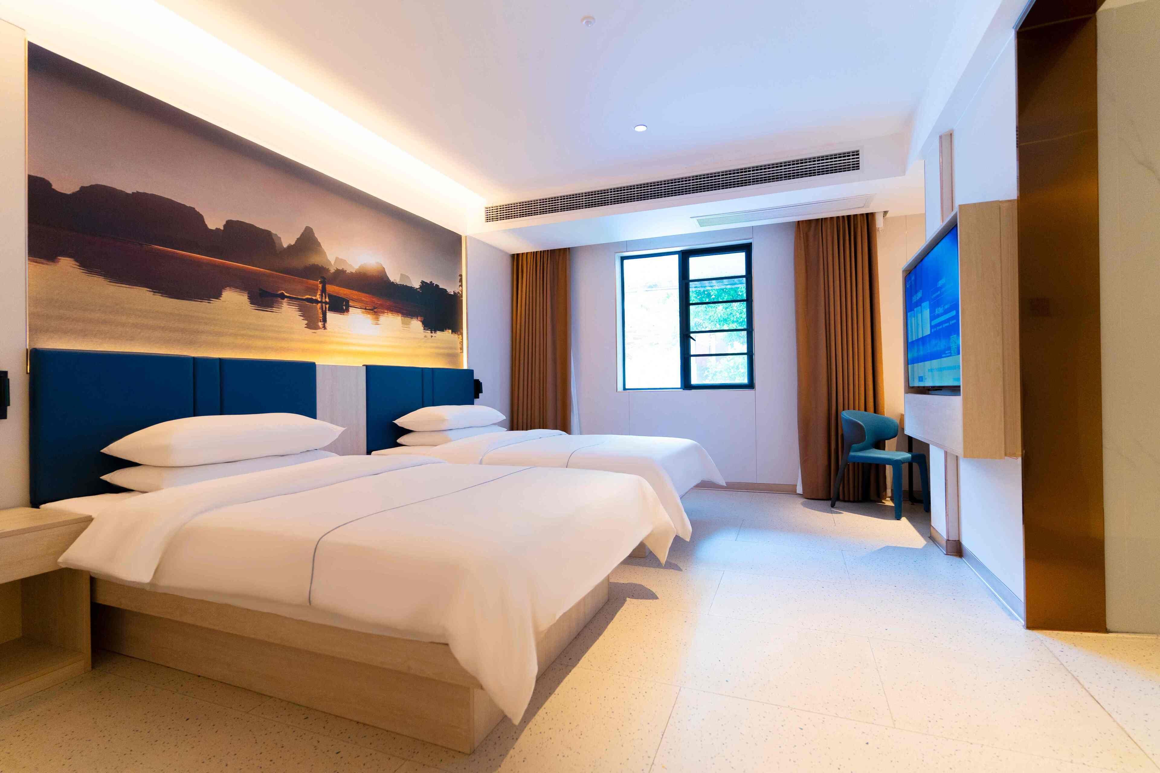 ห้องซูพีเรียทวิน | เครื่องนอนระดับพรีเมียม, โต๊ะทำงาน, ผ้าม่านกันแสง, Wi-Fi ฟรี