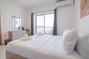 2 bedrooms, desk, iron/ironing board, travel crib