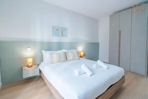 1 bedroom, desk, iron/ironing board, travel cot