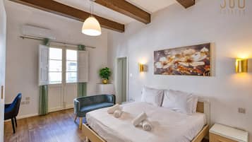 1 bedroom, desk, iron/ironing board, travel crib