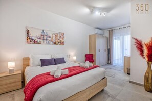 2 bedrooms, desk, iron/ironing board, travel crib