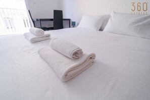 1 bedroom, desk, iron/ironing board, travel crib
