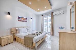 1 bedroom, desk, iron/ironing board, travel crib